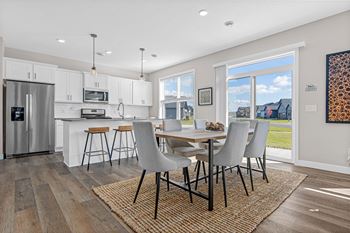 Open concept kitchen with designated dining area